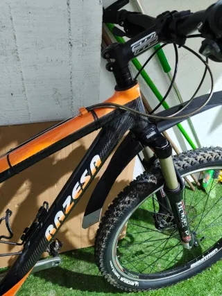 Bicicleta de Montaña Razesa Naranja de Carbono