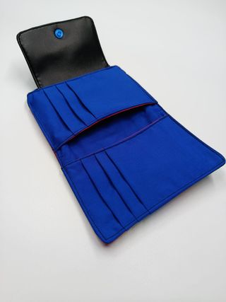 Cartera Tie Chic arcoíris y negra