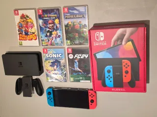 Nintendo Switch OLED + 5 Giochi + Accessori