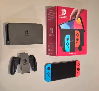 Nintendo Switch OLED + 5 Giochi + Accessori