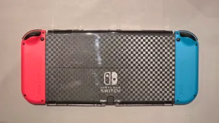 Nintendo Switch OLED + 5 Giochi + Accessori