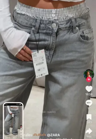 Pantalón campana Zara T38 gris
