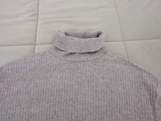 Jersey fino cuello alto jaspeado