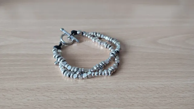 Pulsera de Zamak de doble cadena