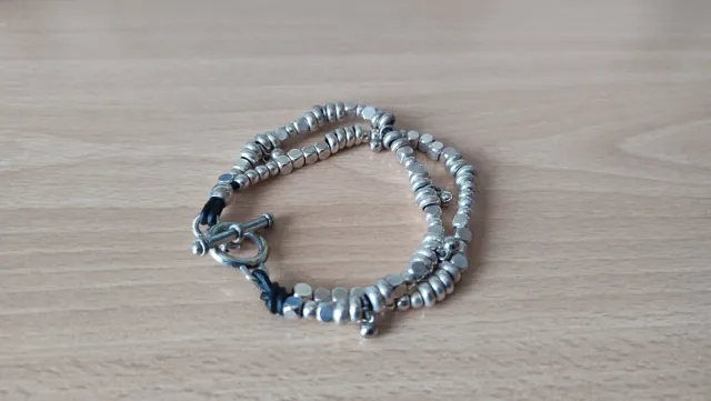 Pulsera de Zamak de doble cadena