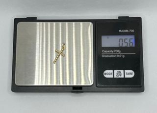 Colgante Cruz Bolas de oro de 18k, 0.56 g.