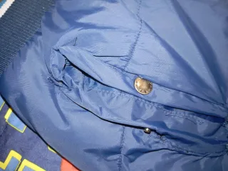 Giubbino bambino , un po' le tasche cucite(foto)