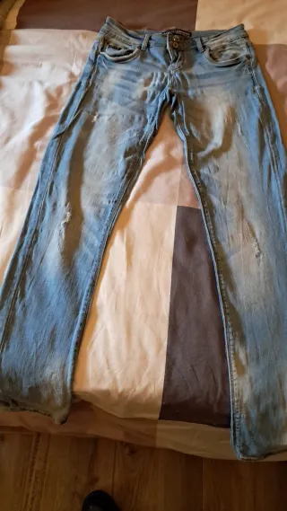 Jeans scoloriti blu, nuovi cappotti