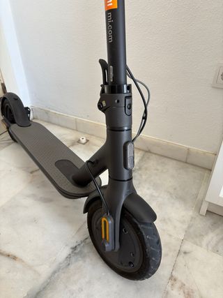 Patinete eléctrico y compresor de aire portatil