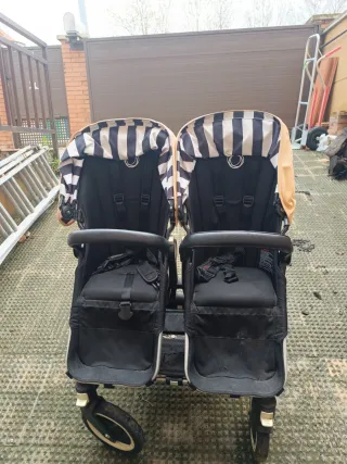 Bugaboo donkey gemelar con accesorios