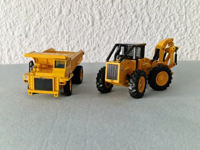 Camión volquete y tractor forestal , Caterpillar
