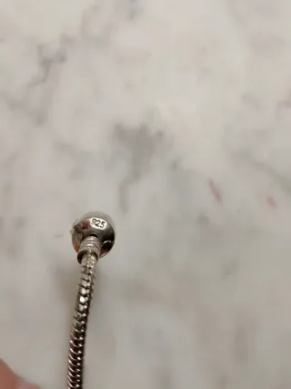 Pulsera plata con charm corazón