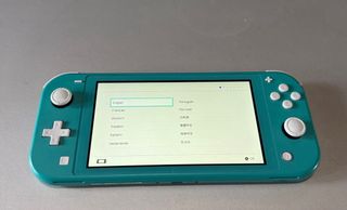 Nintendo Switch Lite + 3 Giochi + Custodia