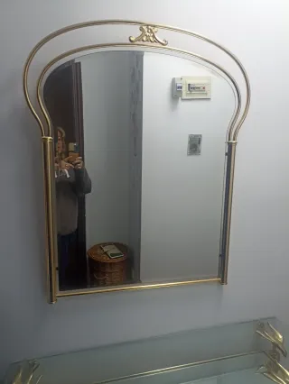 Mobile d'ingresso in metallo dorato