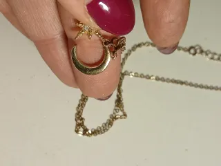 Collana con stella e luna dorata