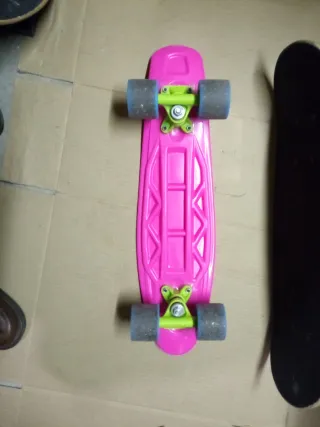 Monopatín rosa