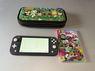 Nintendo Switch Lite Nera + 2 Giochi + Custodia