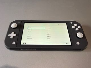 Nintendo Switch Lite Nera + 2 Giochi + Custodia