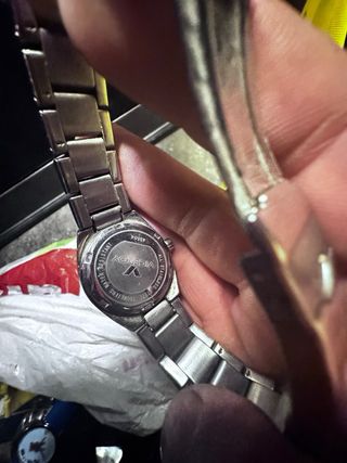 Reloj azul con diseño de personajes