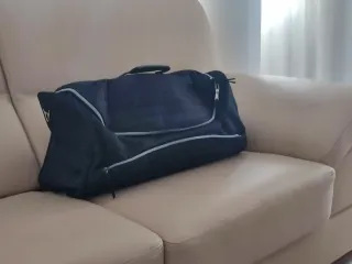 Bolsa de viaje y neceser negro