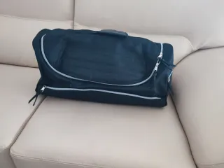 Bolsa de viaje y neceser negro