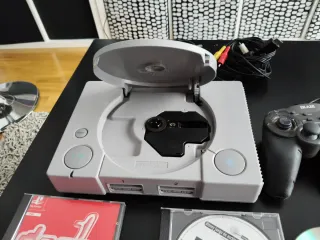 Consola Sony PSX + Mando y Juegos