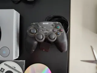 Consola Sony PSX + Mando y Juegos