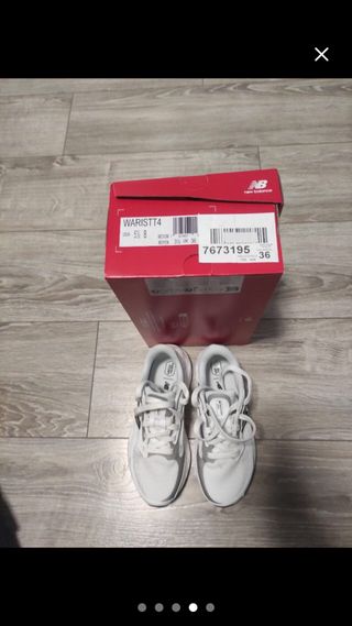 New Balance Blancas/Gris Talla [Talla]