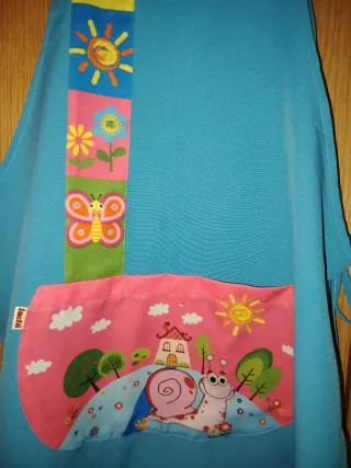 Delantal de maestra. Nuevo, sin estrenar.