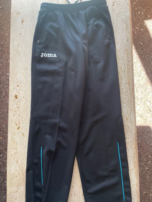 Conjunto deportivo Joma blanco y negro