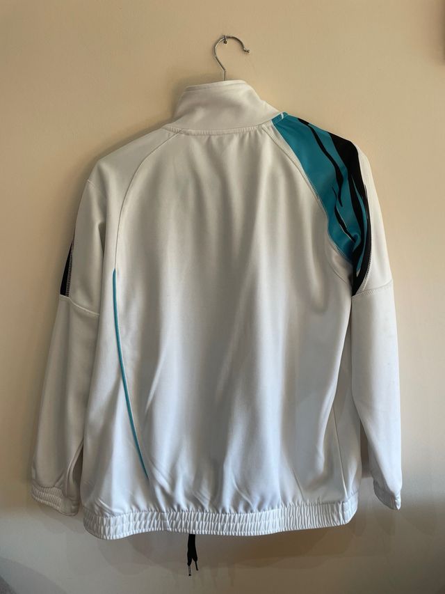 Conjunto deportivo Joma blanco y negro