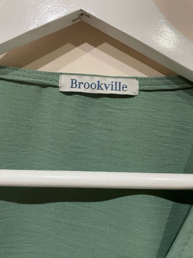 Blusa verde con fruncido y lazada