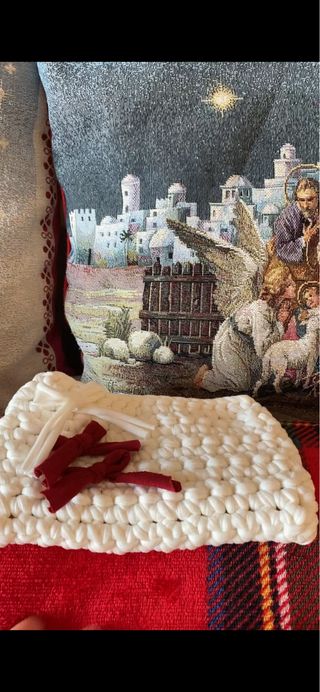 Pochette bianca con lacci rossi