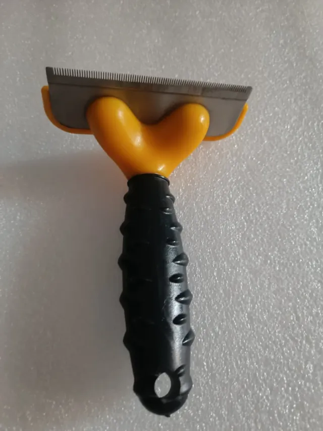 Spazzola per la rimozione del pelo per cani/gatti media FURminator