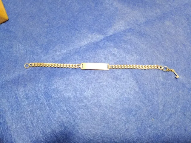 Pulsera de plata maciza con placa