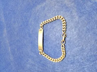 Pulsera de plata maciza con placa