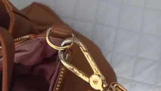 Borsa Coccinelle in pelle marrone