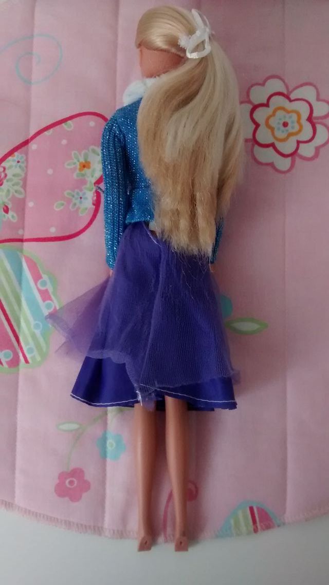MUÑECA STEFFI LOVE CON ROPA BARBIE