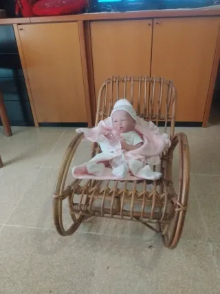 Sedia a dondolo in rattan