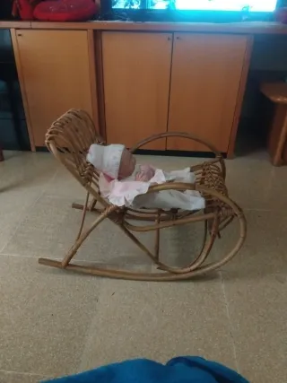 Sedia a dondolo in rattan