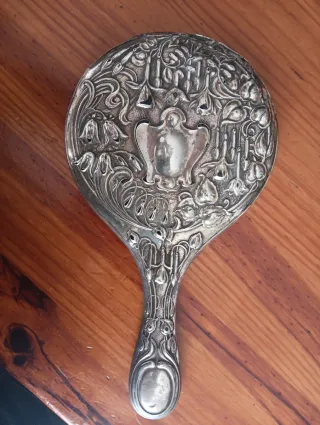 Espejo de mano plateado antiguo