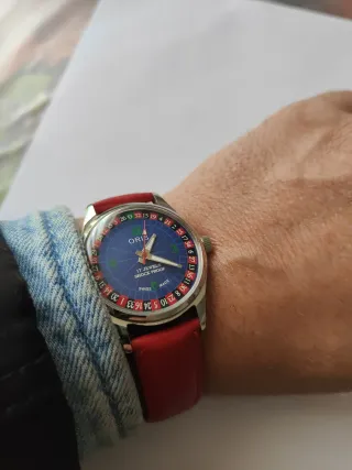 Reloj Oris de cuerda azul y rojo
