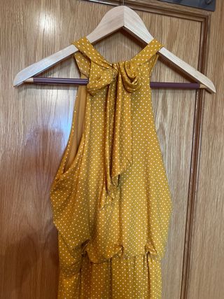 Mono amarillo con lunares blancos