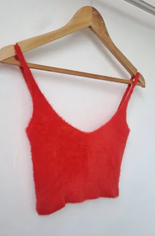 Top peludo rojo