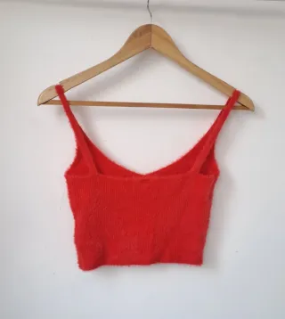 Top peludo rojo