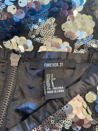 Falda corta lentejuelas plateadas