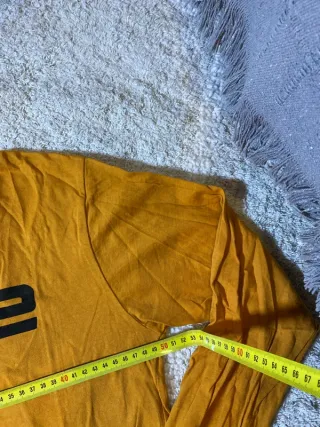 Camiseta Inside manga larga sportswear mostaza