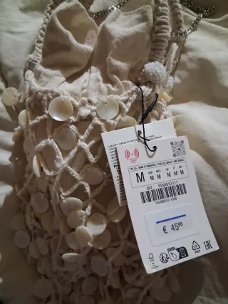 Bolso efecto nacarado con cadena