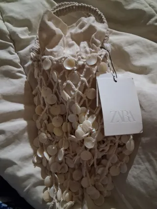 Bolso efecto nacarado con cadena