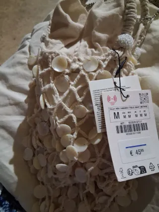 Bolso efecto nacarado con cadena